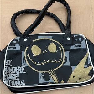 Nightmare Before Christmas Jack Skellington handbag, black and gold logo.